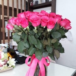 Florero con 100 Rosas Fushia